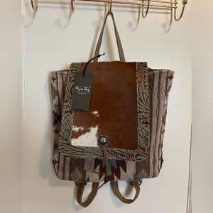 Myra Bag Backpack Upcycled Cowhide and Western Rug details